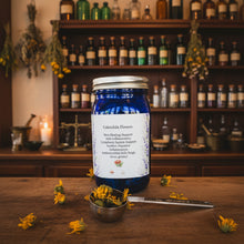 Load image into Gallery viewer, Blue jar labeled 'Calendula Flowers' with dried flowers on a white surface.