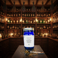 Blue glass jar with dandelion root supplement on a white background