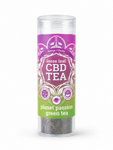 Load image into Gallery viewer, A clear cylindrical plastic jar of CBD tea with a purple and green label reading 'loose leaf CBD TEA' and 'planet passion green tea'.