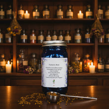 Load image into Gallery viewer, Blue jar labeled 'Turmeric Root' with a spoonful of turmeric on a patterned background