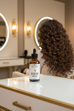 Load image into Gallery viewer, Mary's Jane CBD Hair Serum - Long Curly Hair Salon Scene